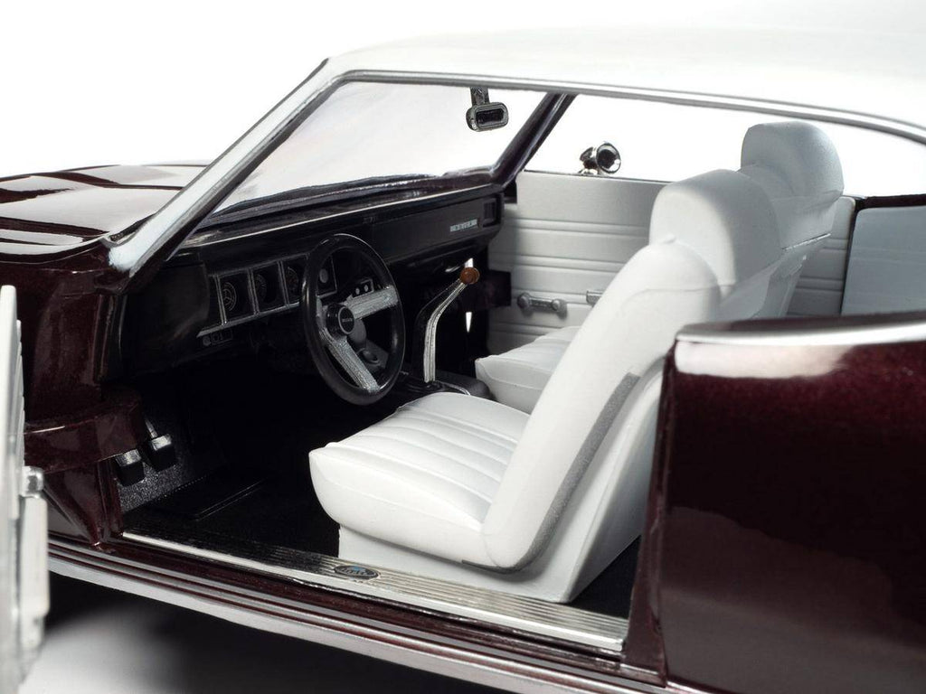 Close up of the driver's side interior in a model car of a 1970 Buick GS.