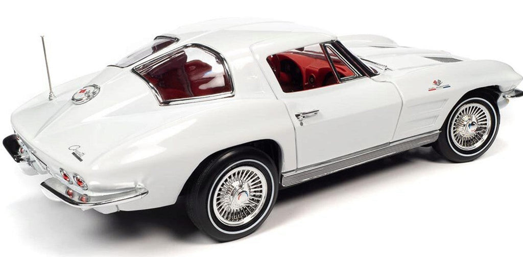 1/18 scale model of a 1963 Chevrolet Corvette Split Window Coupe in white color with a detailed red interior and chrome wheels.
