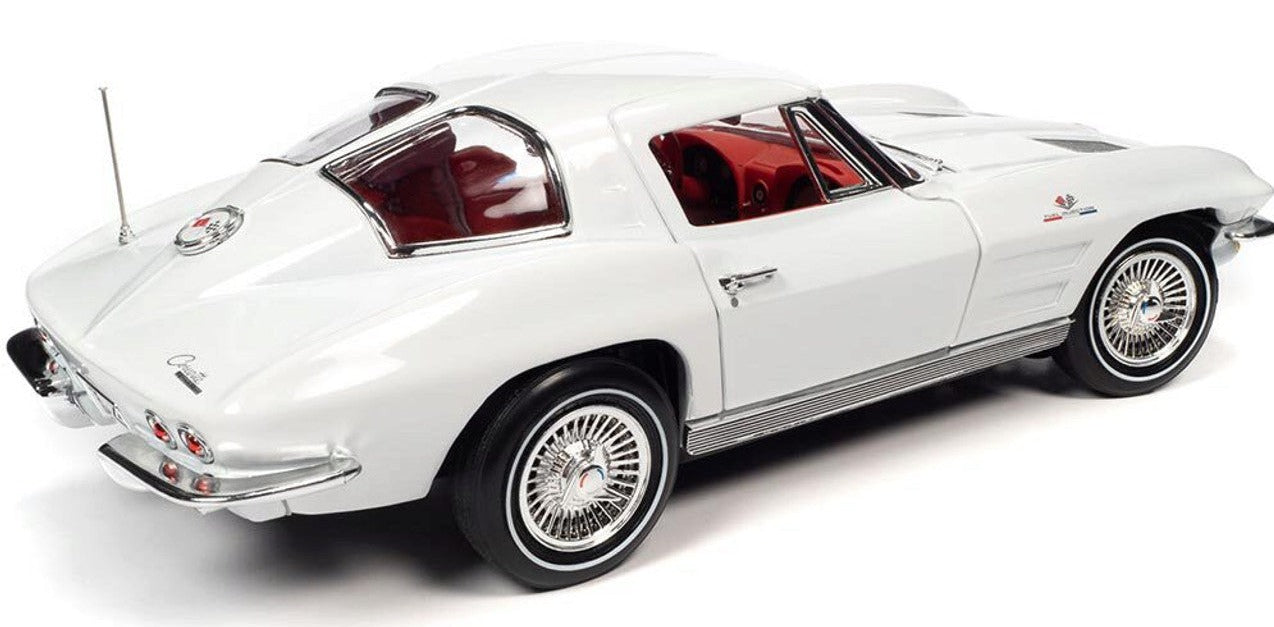 1/18 scale model of a 1963 Chevrolet Corvette Split Window Coupe in white color with a detailed red interior and chrome wheels.