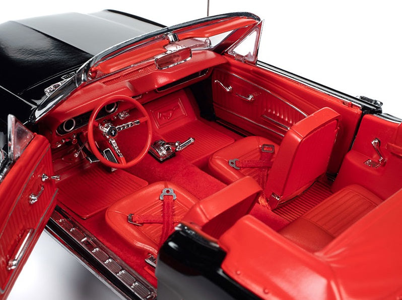 Close up of red interior in a diecast model Ford Mustang.