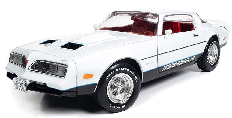 A 1/18 scale diecast model of a 1977 Pontiac Firebird Formula with a white body, red interior, and black details.