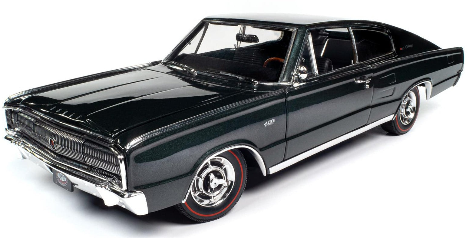 Diecast model car of 1966 Dodge Charger in dark green.