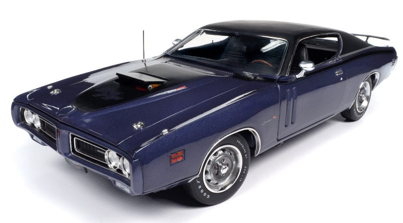 A 1/18 scale model of a 1971 Dodge Charger R/T in Plum Crazy color with black roof.