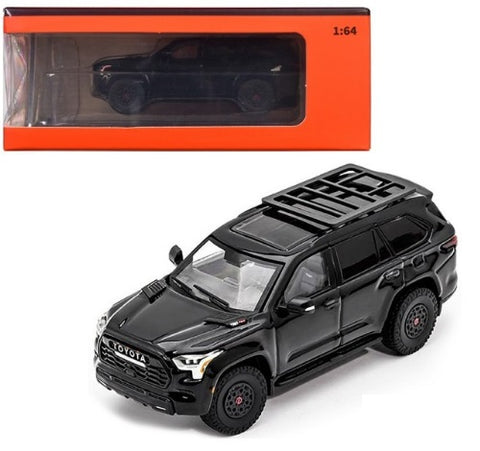 Model car of a 2023 Toyota Sequoia TRD Pro in black, with the same car pictured in orange package with clear display window.