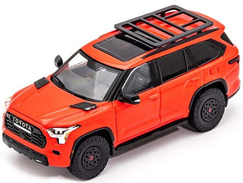 Model car of a 2023 Toyota Sequoia TRD Pro in orange.