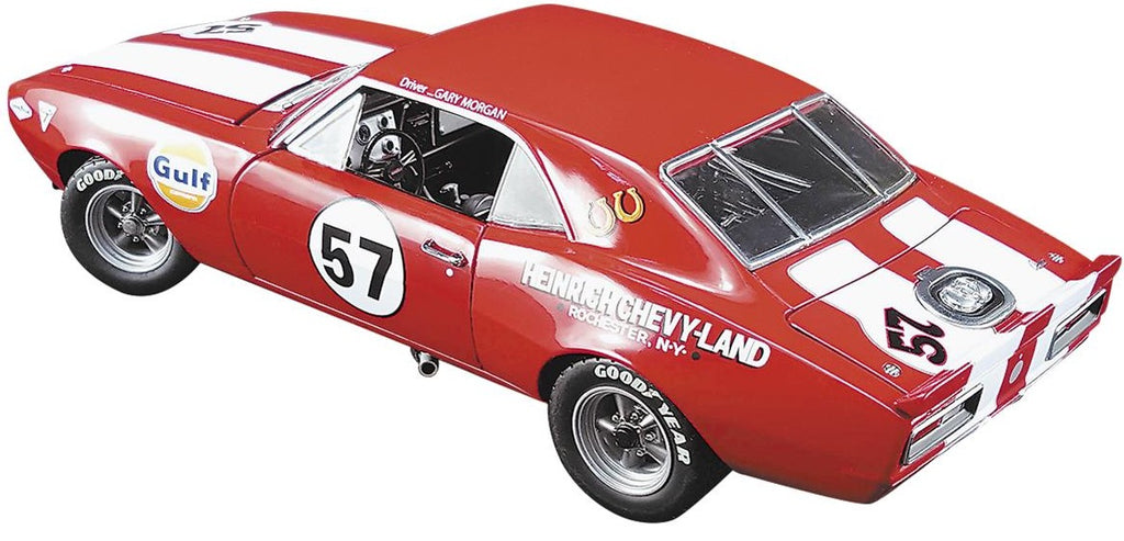 1/18 scale diecast model car of 1967 Chevy Camaro with the number 57 on the door and other racing graphics on the sides.