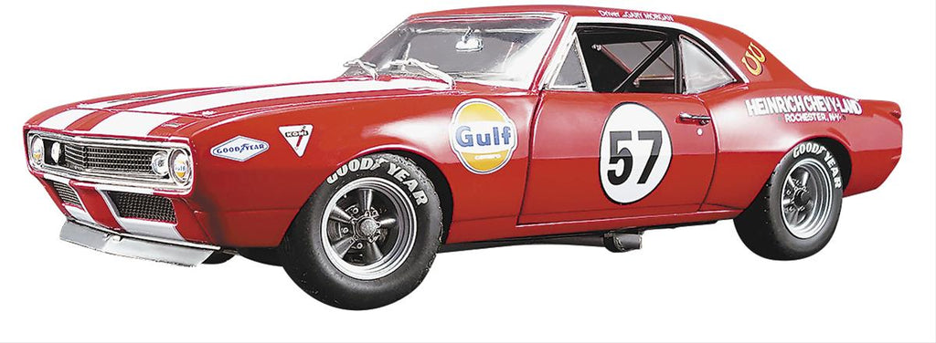 1/18 scale diecast model car of 1967 Chevy Camaro with the number 57 on the door and other racing graphics on the sides.