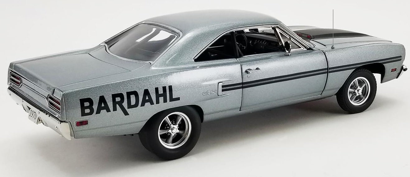 A scale model of a 1970 Plymouth GTX in gray metallic with black stripes and "BARDAHL" on the sides.