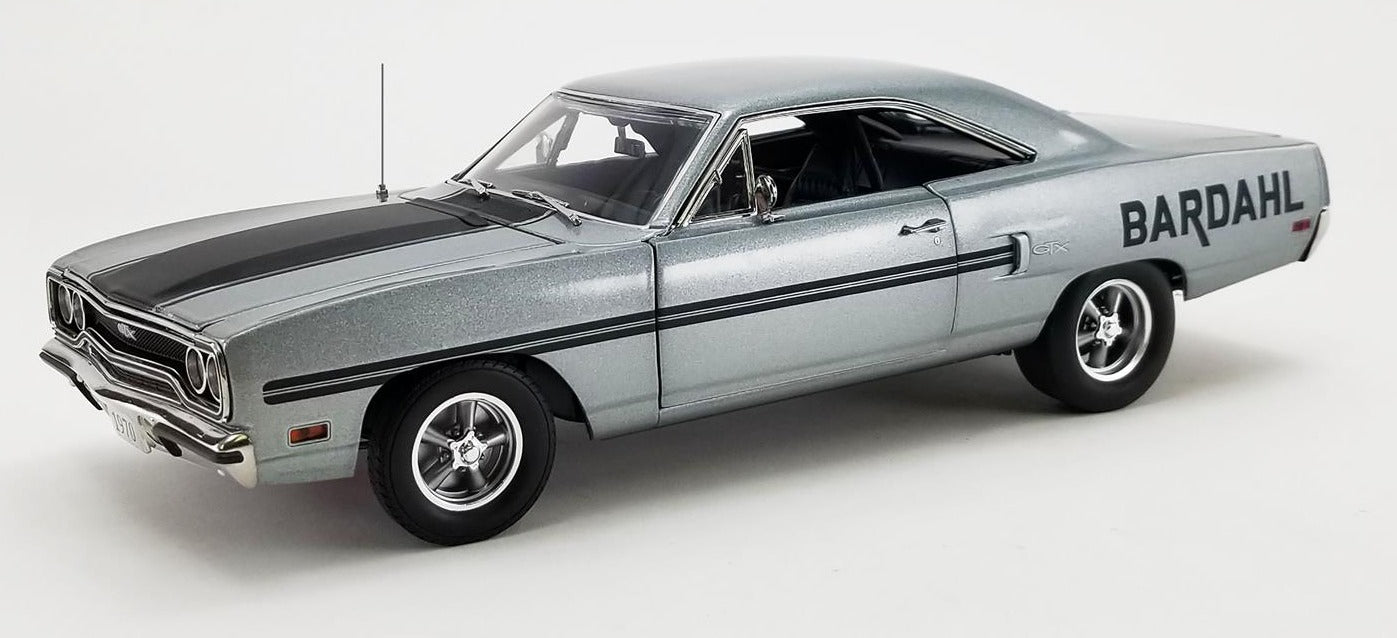 A scale model of a 1970 Plymouth GTX in gray metallic with black stripes and "BARDAHL" on the sides.