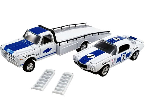 1/64 scale model of a ramp truck and Chevy Trans Am Camaro in matching white with blue paint scheme.