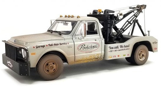 1/18 scale model of a Chevrolet C-30 Wrecker tow truck.