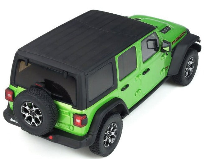 A scale model of a 4 door Jeep Wrangler Rubicon in green with a black hard roof.