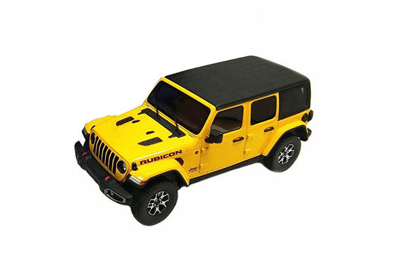 Scale model of yellow 4 door Jeep Rubicon with black roof.
