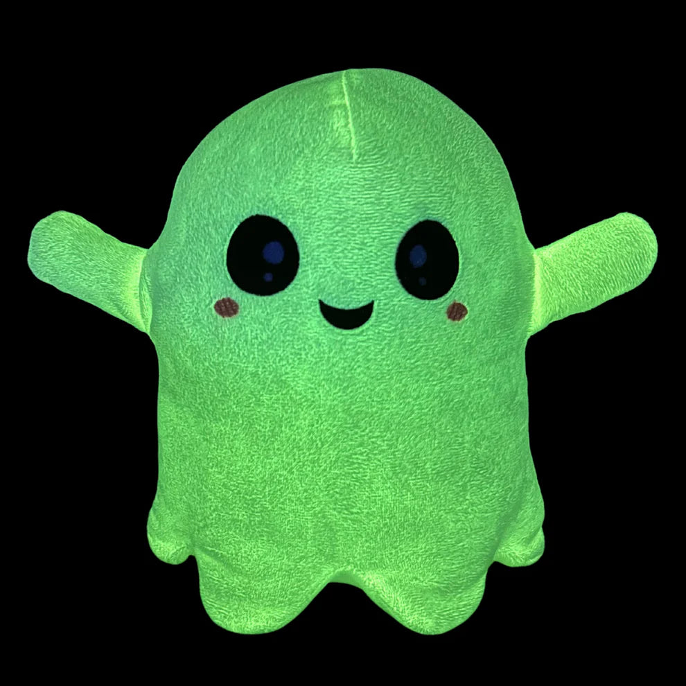 Glow int he dark ghost plush toy with black eyes and grin.