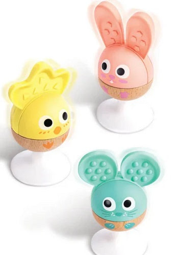 Three colorful animal-shaped toys on a white background
