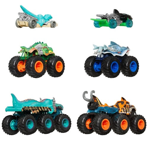 Set of 6 colorful shark or dinosaur shaped vehicles.