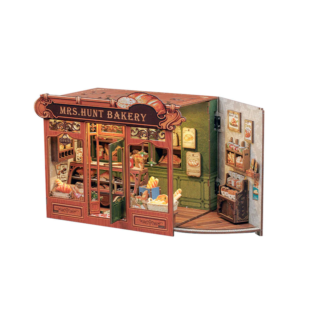 Model of a bakery with detailed interior on a white background