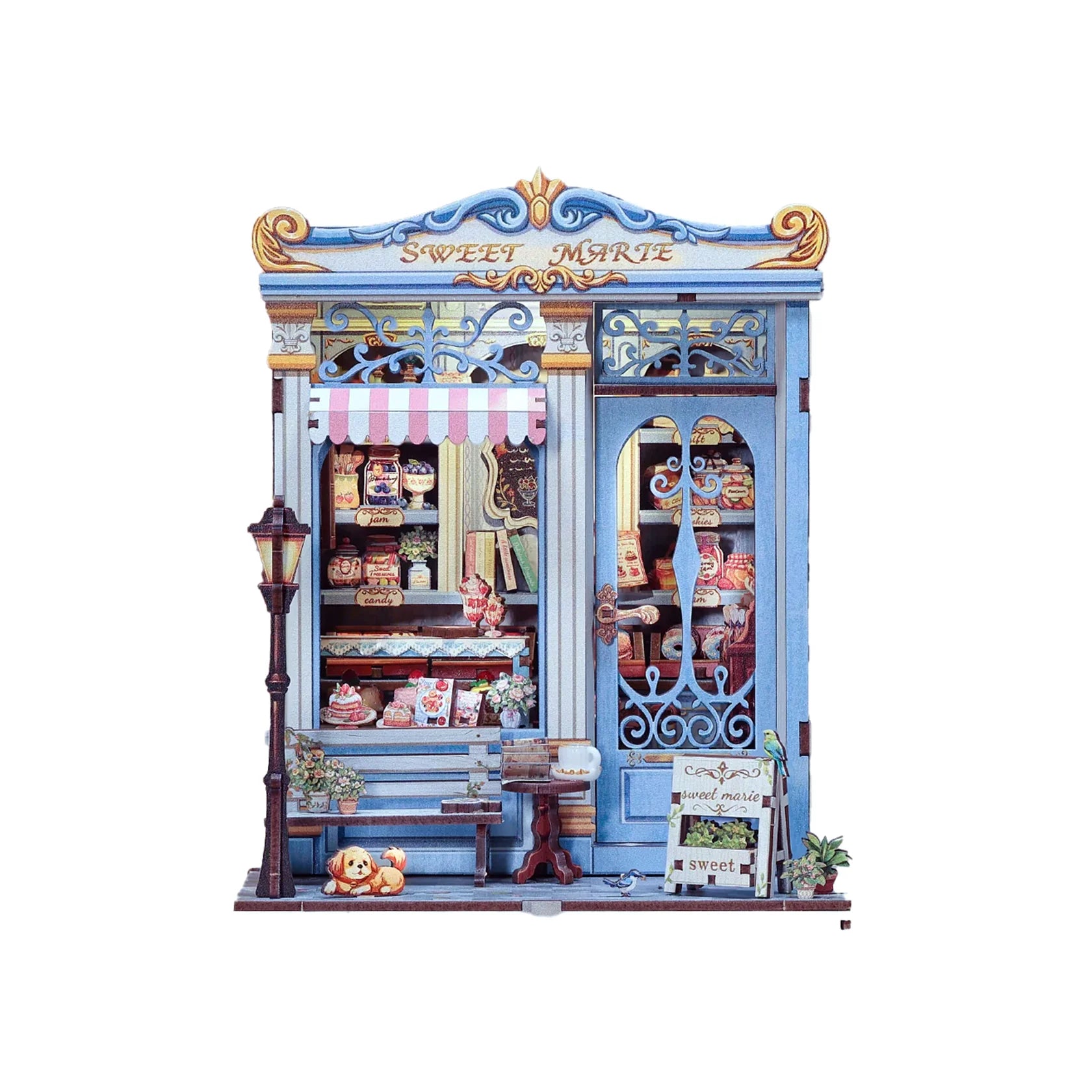 Assembled of "Sweet Marie" book nook kit, showing a blue store front with various candies inside.