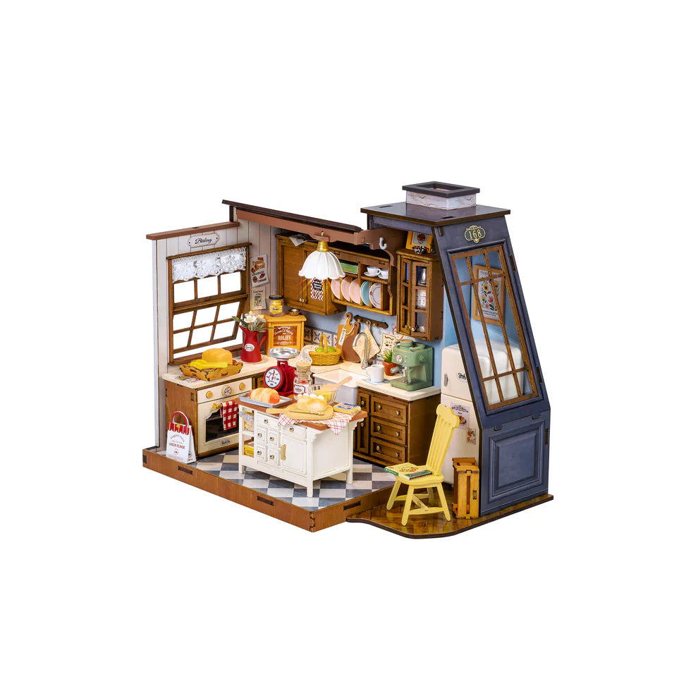 Assembled "Baking Kitchen" diorama kit.   A cut away of a kitchen withe counters covered in kitchen items.