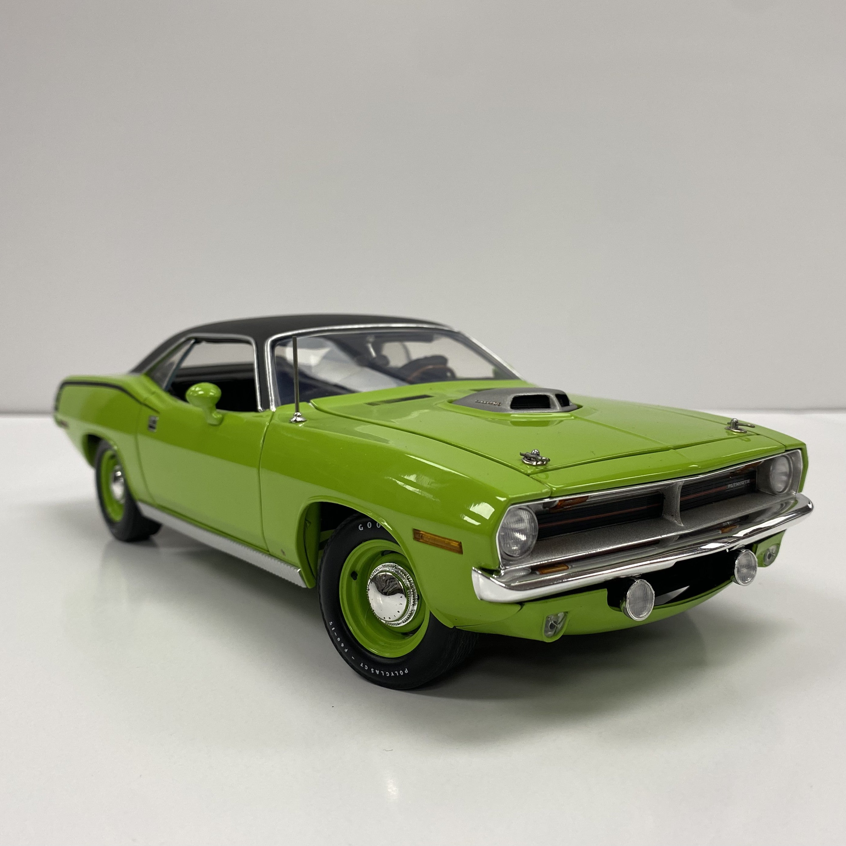 Diecast model of 1970 Cuda with vinyl top.