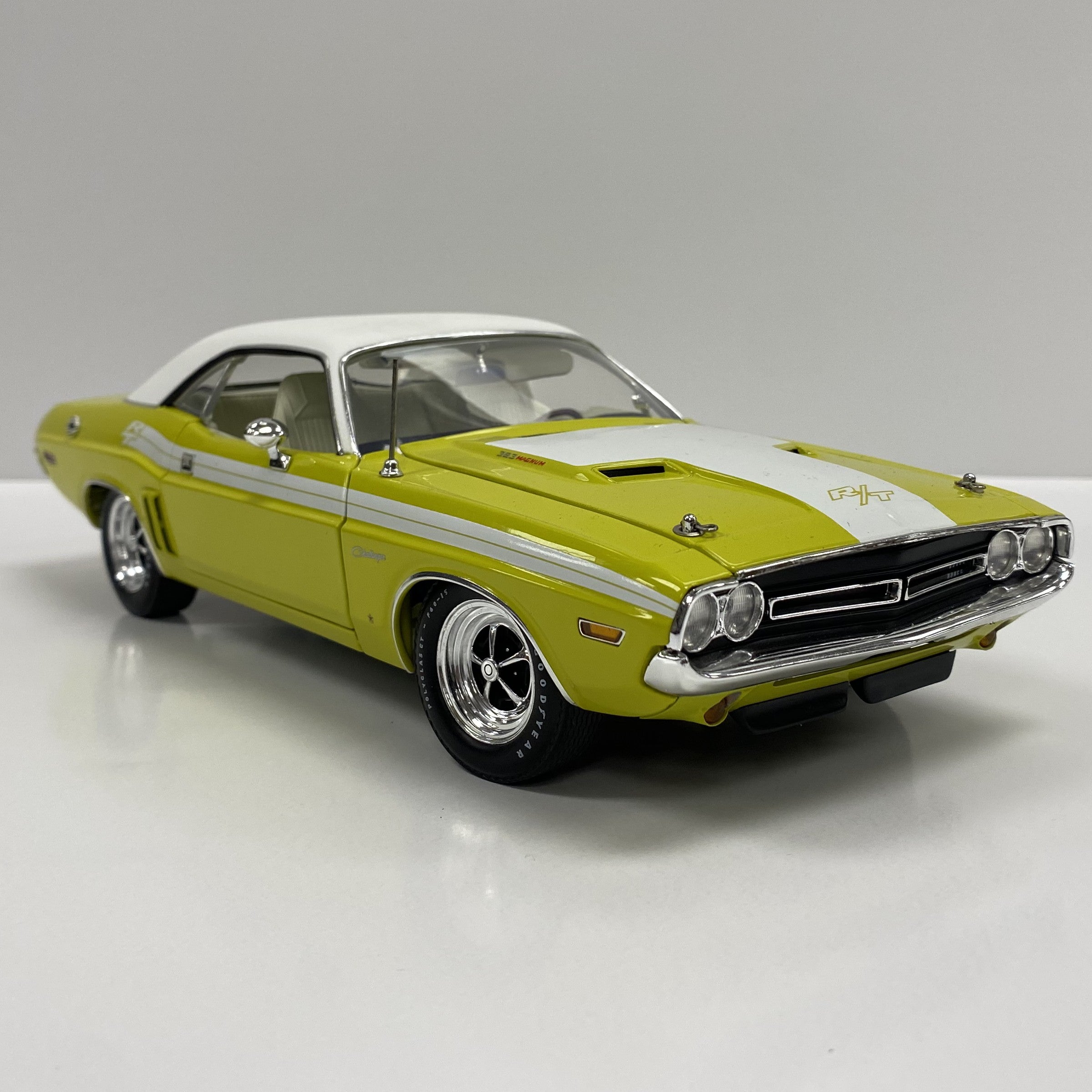 Scale model of 1971 Dodge Challenger in Citron Yellow with vinyl top.