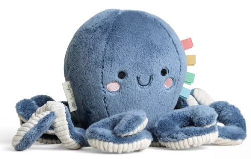 Blue plush octopus toy with a smiley face on a white background