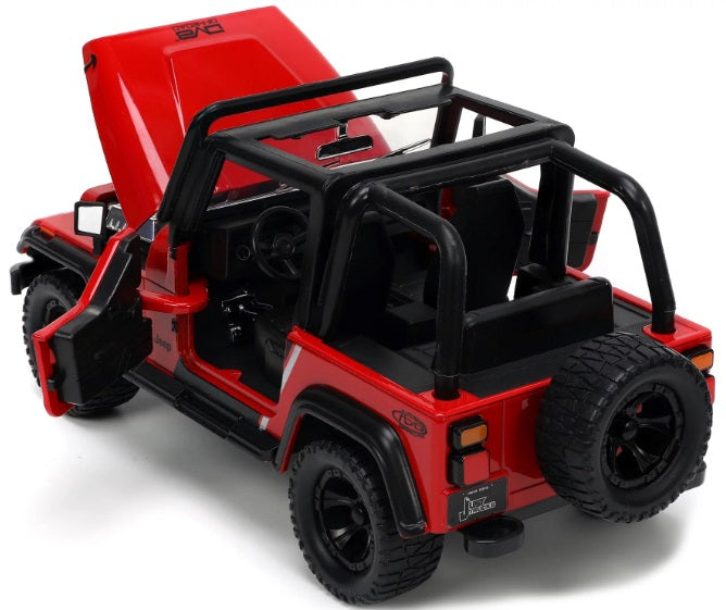 Scale model of Jeep Wrangler with top off and doors open.