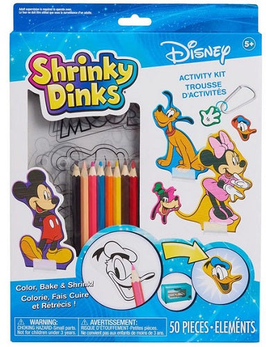 Packaging of Shrinky Dinks Disney Mickey Classic Kit featuring illustrations of Mickey Mouse and other Disney characters, with pens and activity materials visible.