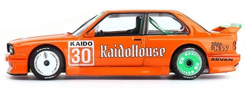 Orange model car with 'Kaido' and 'Kaido House' branding on a white background