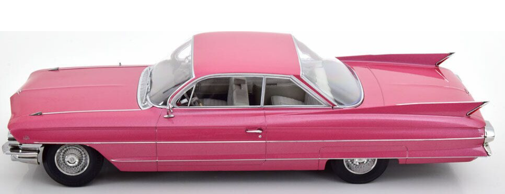 1962 Cadillac Series 62 Coupe DeVille pink in color.