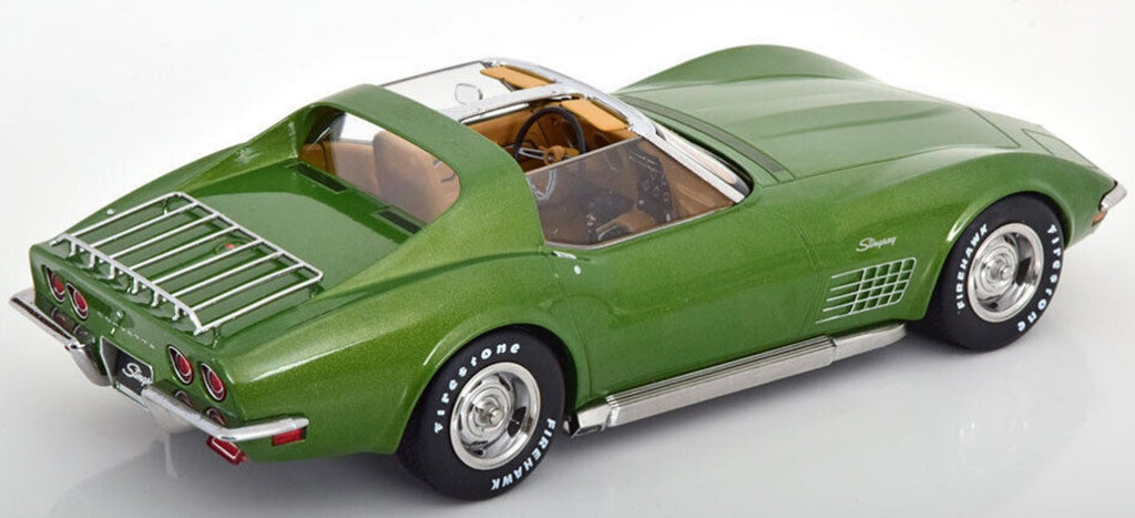 A 1/18 scale model of a 1972 Chevy Corvette C3 Stingray in green color.
