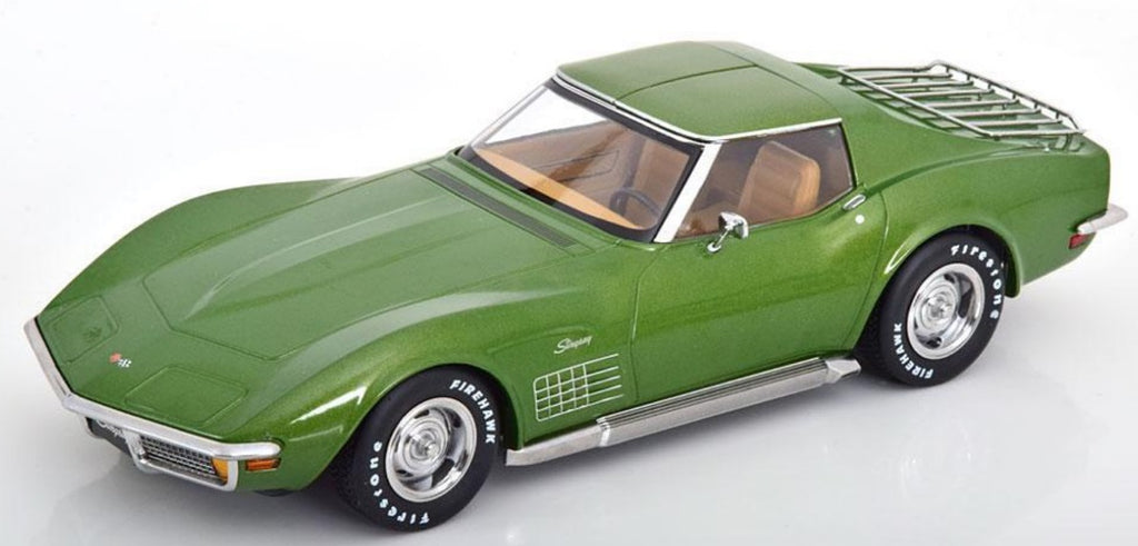 A 1/18 scale model of a 1972 Chevy Corvette C3 Stingray in green color.