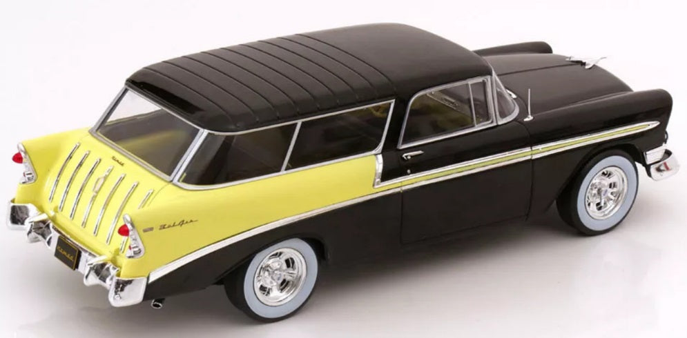 A 1/18 scale model of a 1956 Chevy Bel Air Nomad in black and yellow color.
