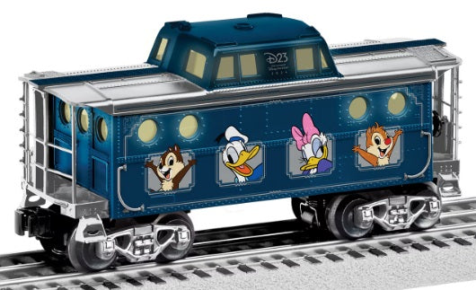 Model train caboose with Mickey Mouse Characters pictured on the side.