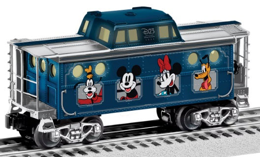 Model train caboose with Mickey Mouse Characters pictured on the side.