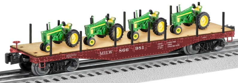Milwaukee Road Flat car with John Deere tractor load.