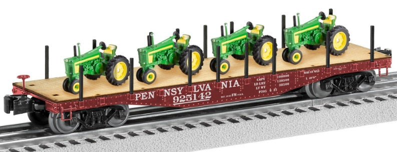 O Scale flat car with 4 John Deere tractors.