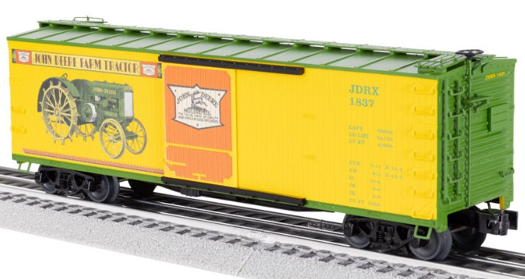 Scale model of green and yellow box car