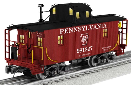 Model of red Pennsylvania Caboose with black roof.