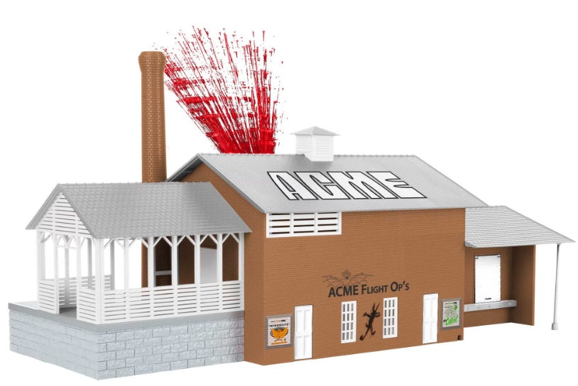 Model of ACME Dynamite factory with fake red explosions.