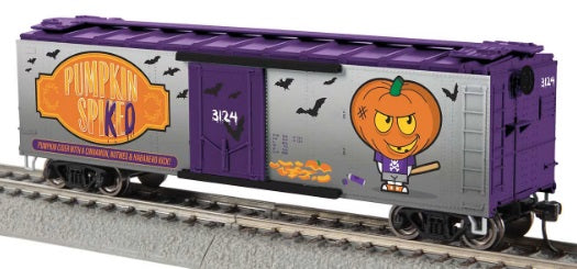 HO scale Halloween-themed train reefer with Jack-o-lantern character and "Pumpkin Spiked" on the side