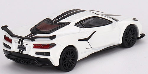 1/64 scale model of a white Corvette with black stripes and black wheels.