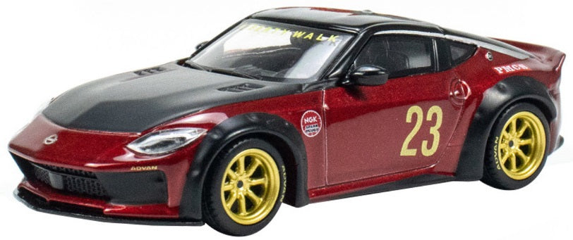 A 1/64 scale model of a red Nissan Z LB Nation Works Gem with black details and gold wheels.