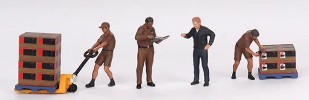 A 1/64 scale model set depicting a UPS driver and workers scenario, including figures with 2 pallets of boxes and a pallet jack.