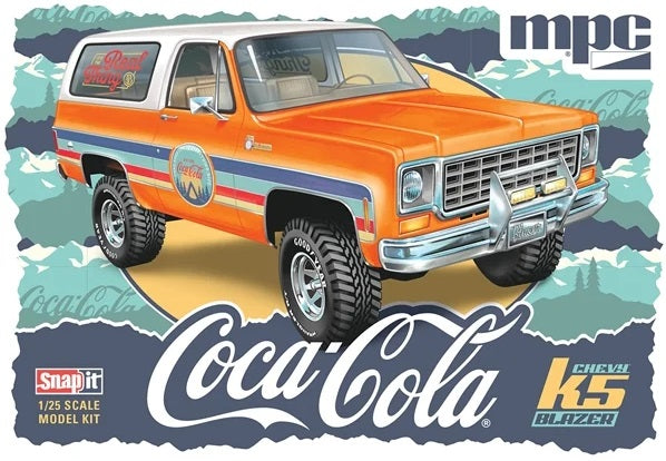 Model kit box for a Chevrolet K5 Blazer with Coca-Cola branding on a scenic background.