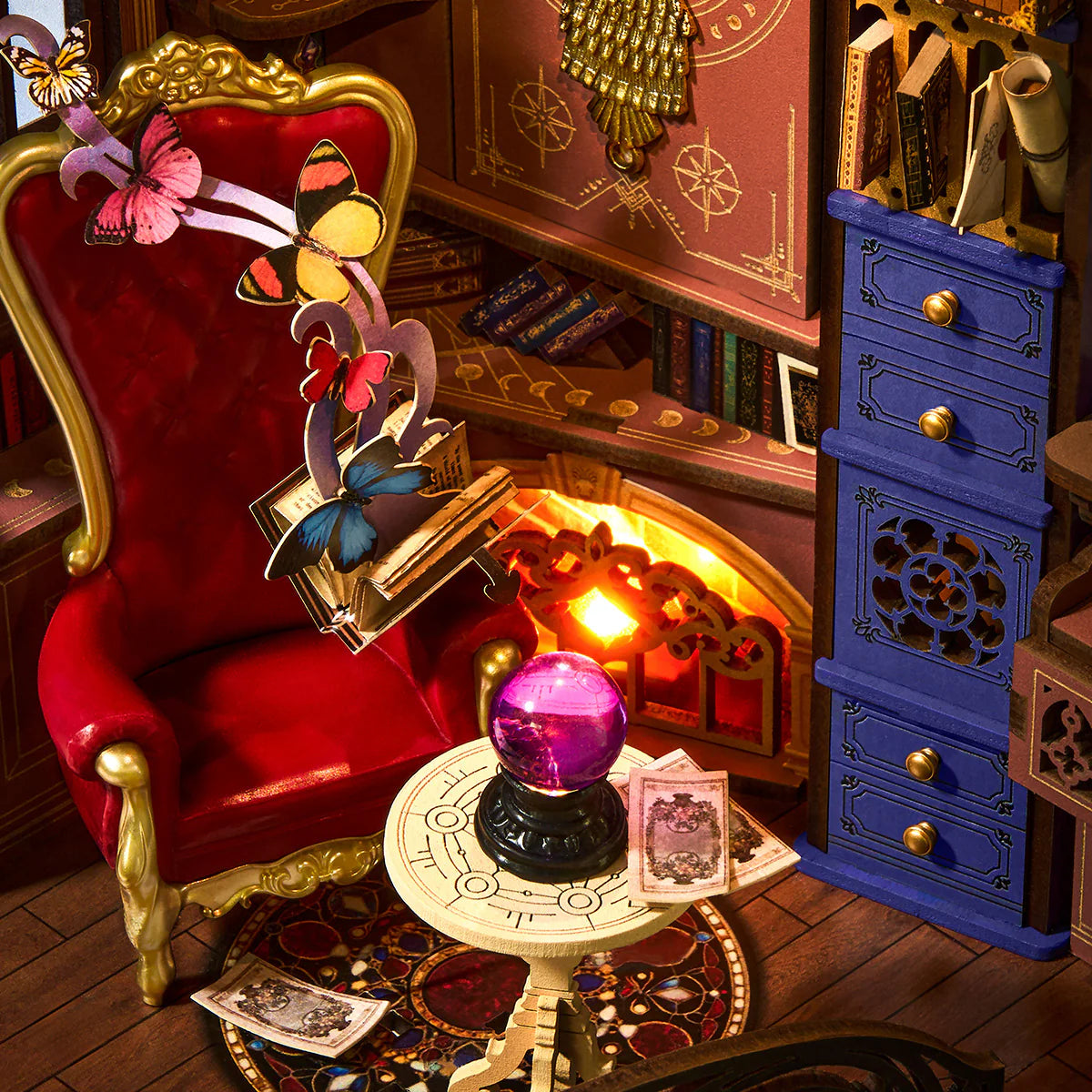 Decorative room with a red chair, blue cabinet, and mystical elements.