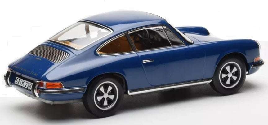 A 1/18 scale model of a 1969 Porsche 911 S in blue color.