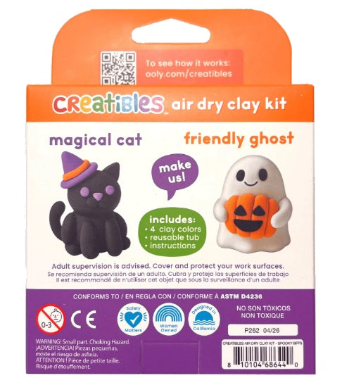 Halloween themed air dry clay kit showing a black cat with purple hat and a ghost with jack-o-lantern made of clay.