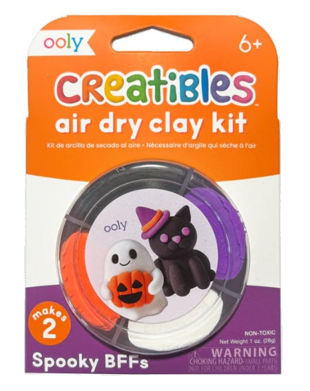 Air dry clay kit including black, orange, purple, and white clay, with picture of ghost and black cat made of clay on the package.