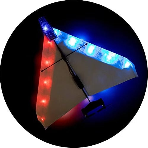 Plane with red lights on one side and blue lights on the other side.